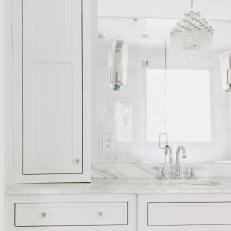 White Bathroom Countertop and Chandelier