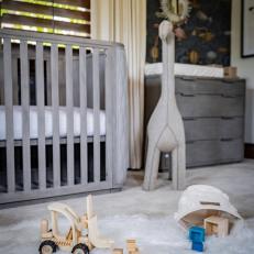 Gray Contemporary Nursery With Wood Toy