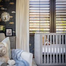 Gray Contemporary Nursery With Striped Armchair