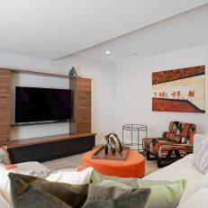 Contemporary Media Room With Orange Coffee Table