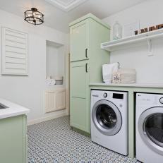 Transitional Laundry Room With Green Cabinets