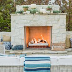 Coastal Outdoor Fireplace With Blue Whale
