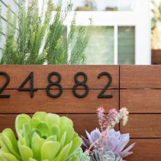 Wood Fence and Black House Numbers