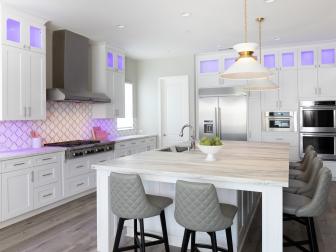 California designer Cailey Damron was tasked with transforming this new build in Glendora, California. "The homeowners brought me onto the project to add a luxurious and chic designer's touch to this builder-grade home through the use of new lighting, custom cabinetry, and high-quality natural materials," says Cailey