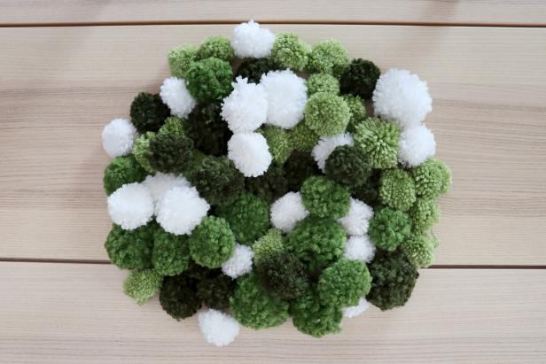 colorful yarn pom-poms for christmas tree forest wreath