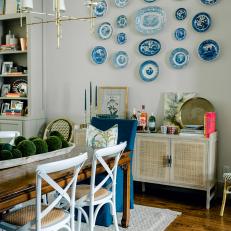 Eclectic Dining Room With Plates