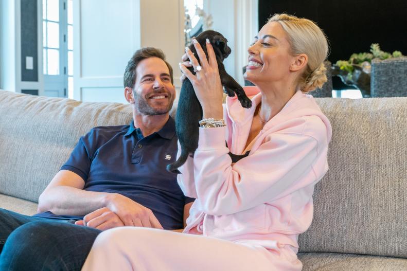 As seen on HGTV’s Flipping 101, host Tarek El Moussa at home with fiancé Heather Rae Young and new puppy.