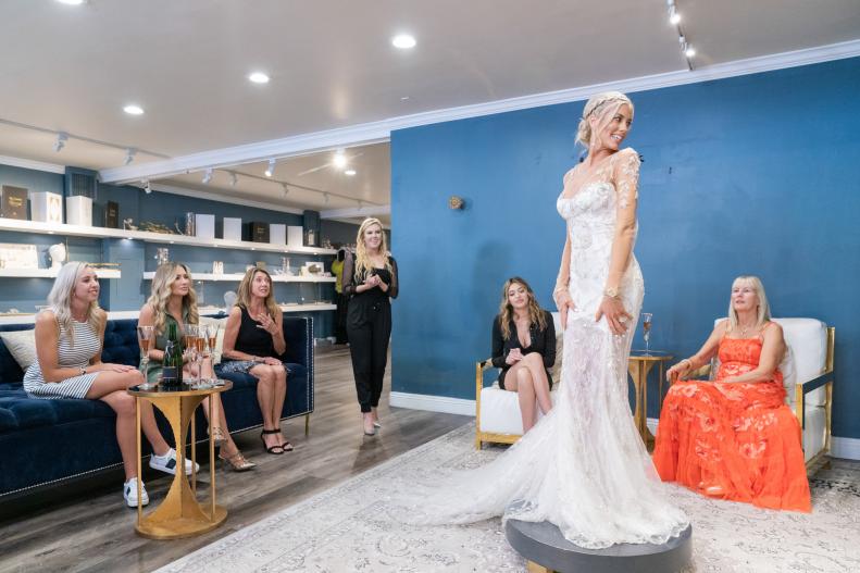 As seen on Discovery+ Original, Tarek and Heather's Wedding Special, Heather Rae Young visits a well known bridal store in Los Angeles with friends and family to try on a handful of gowns in the hopes of finding the one.