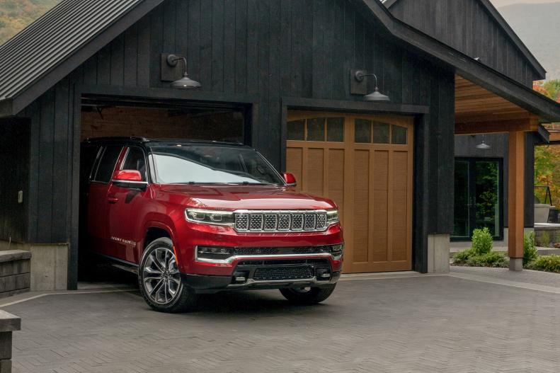 The large, two car garage and extra wide driveway create ample room for parking even larger vehicles like the Jeep Grand Wagoneer that comes with HGTV Dream Home 2022.