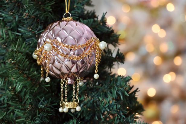 That’s it! We’ve made a glitzy, glam hot air balloon ornament that will bring some sparkle to any Christmas tree.