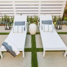 Two White Lounge Chairs on Paver Patio
