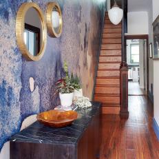 Purple Accent Wall Paired With Antique Wooden Staircase