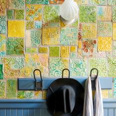 Mudroom With Mosaic Tile Wall and Coat Hanger