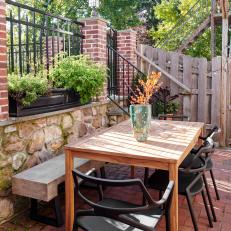 Brick and Stone Outdoor Patio With Seating