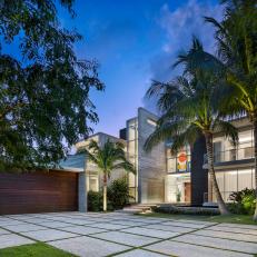 Modern Front Exterior With Limestone Driveway