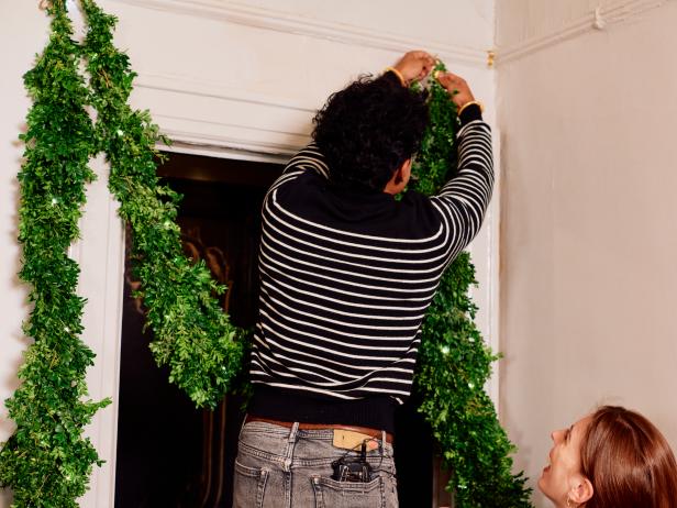 Decorate a doorway with the green garland and enjoy throughout the season.