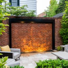 Outdoor Sitting Area With Brick Wall