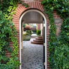 Garden Entrance With Arched Doorway
