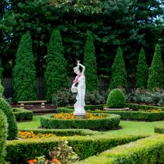 Formal Garden With Statue