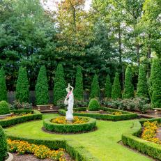 Formal Garden With Evergreen Trees