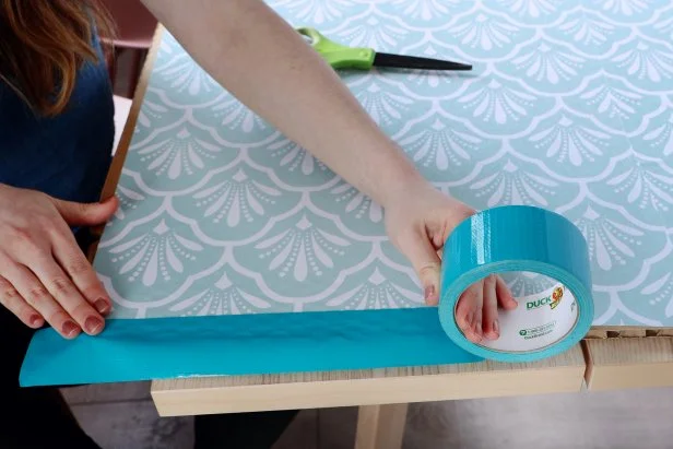 Wrap the sides with duct tape to make them look more finished and hide any uneven edges.