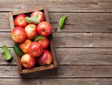 A wooden basket of apples