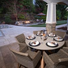 Round Outdoor Dining Table With Pool View
