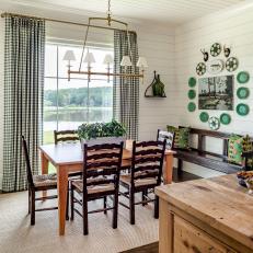 Traditional White Paneled Breakfast Room With Dining Table and Window 