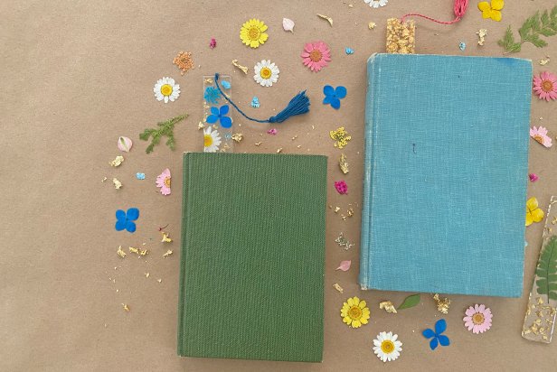 Resin Bookmarks With Dried Flowers Inside Placed In Books on Table