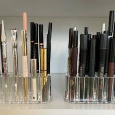Makeup Stored in Acrylic Pencil Holders