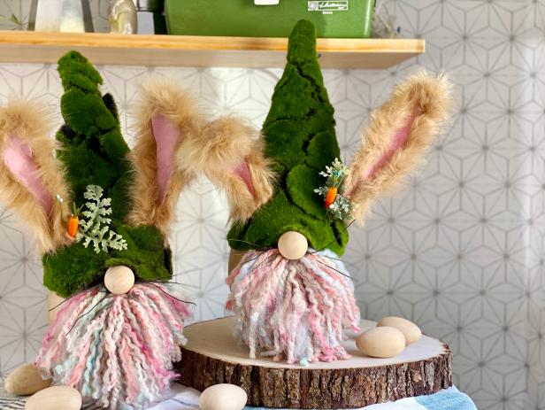 Cut miniature faux floral accessories into smaller pieces and glue them onto the hat. Bend it’s ears, fluff and trim it’s beard to finish the look! Tip: If the egg does not stand, because of the weight of the features or it does not have a flat bottom, glue on a wood slice for a base.