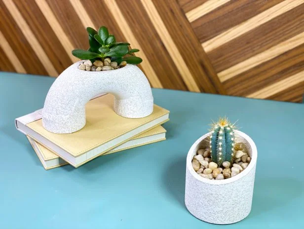 Succulents in PVC pipe planters