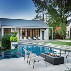 Contemporary Backyard with Matching Pool House