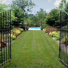 Outdoor Gates Open to Backyard Pool