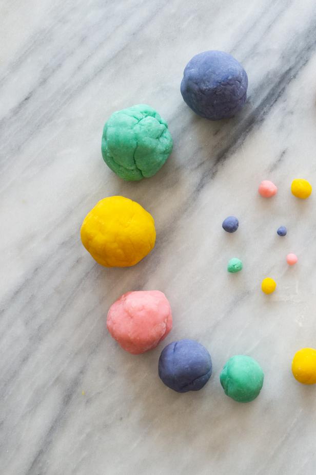 Colorful Balls of Homemade Play Dough on Table