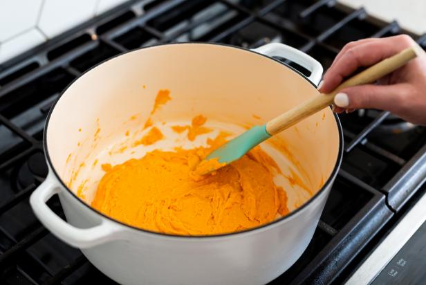 In a saucepan, add 1 cup of flour, 2 teaspoons of cream of tartar and 1/2 cup of salt.  Add food coloring to 1 cup of water to avoid staining hands later. Then pour the water and food coloring into the mixture. Next, add 1 TBS vegetable oil . Turn the burner on medium/low and stir the mixture . Stir with a whisk until the mixture starts to become solid, or when it starts to become thick and lumpy. Once the dough starts sticking together and pulling away from the sides of the pan it's done.
