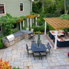 Patio With Outdoor Kitchen and Trellis