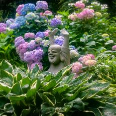 Purple Hydrangeas and Statue
