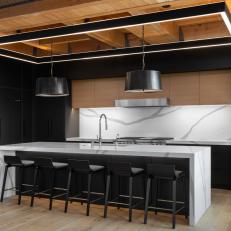 Modern Chef Kitchen With Wood Ceiling
