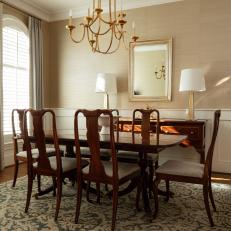 Brown Traditional Dining Room With Arched Window