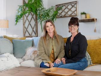 Leslie Davis, left, and her twin sister Lyndsay Lamb, right, pose in den of a house they remodeled in Snohomish, Washington as seen on Unsellable Houses (After)