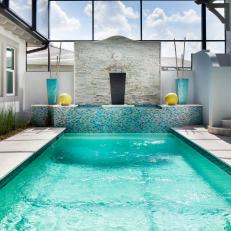 Courtyard With Pool and Yellow Planters