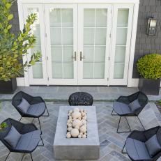 Outdoor Sitting Area With Black Chairs