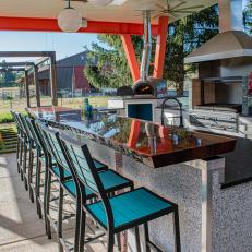 Outdoor Kitchen With Blue Stools