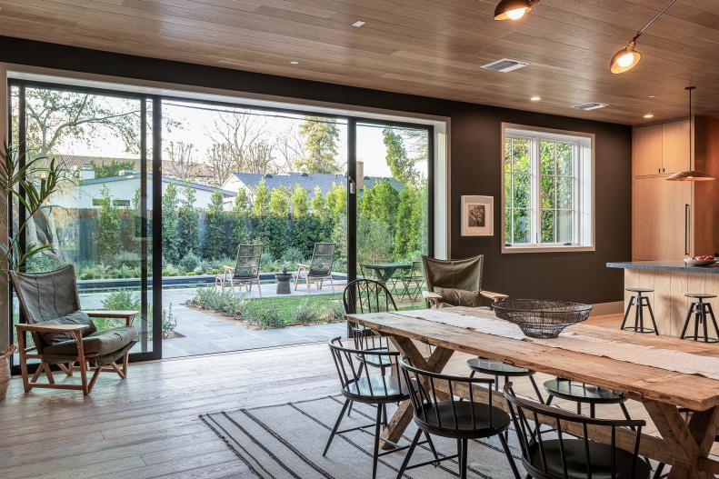 This open-plan dining room includes easy outdoor access.