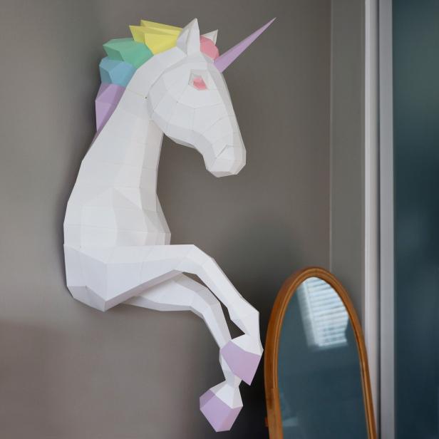 White papercraft unicorn with rainbow mane