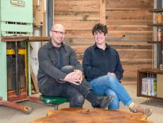 Man and Woman Sitting in Woodworking Studio, Posed for Camera