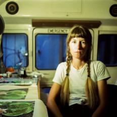 Artist Molly Mansfield in Her School Bus Studio