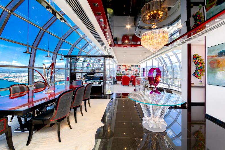 Dining Area With Curved Window Walls