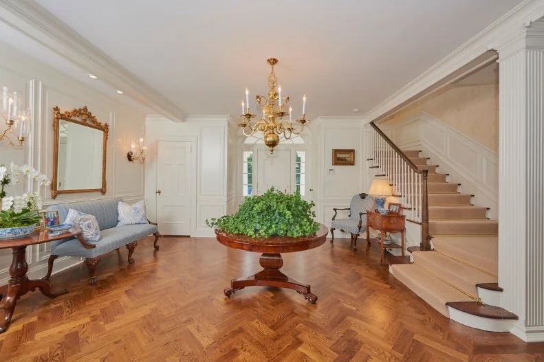 Stately Foyer with Herringbone Floor